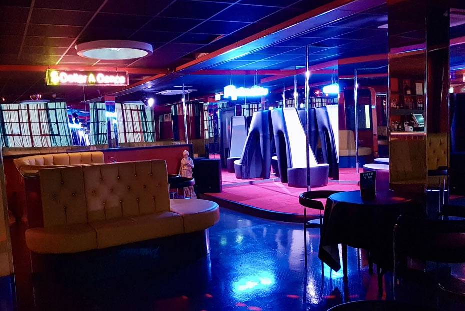 Inside Angels Paradise showing main stage and seating areas