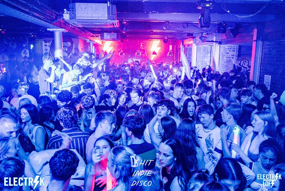 Clubbers dancing inside Electrik club 