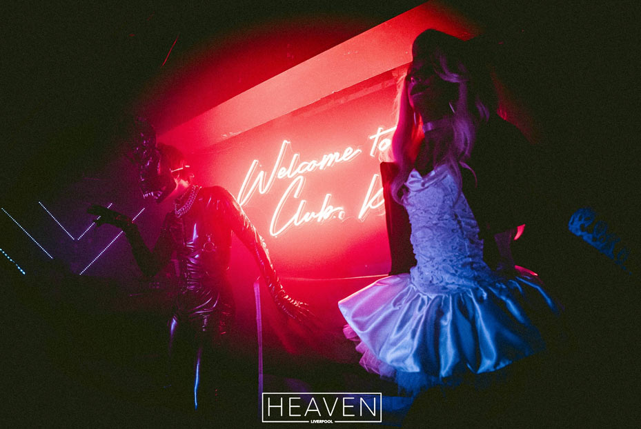 Shemales dancing on stage at Heaven in low-light