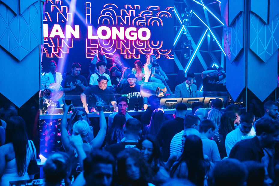 Inside Mansion club showing DJ and clubbers dancing