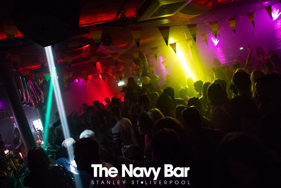 Inside Navy bar showing people dancing on the dance floor